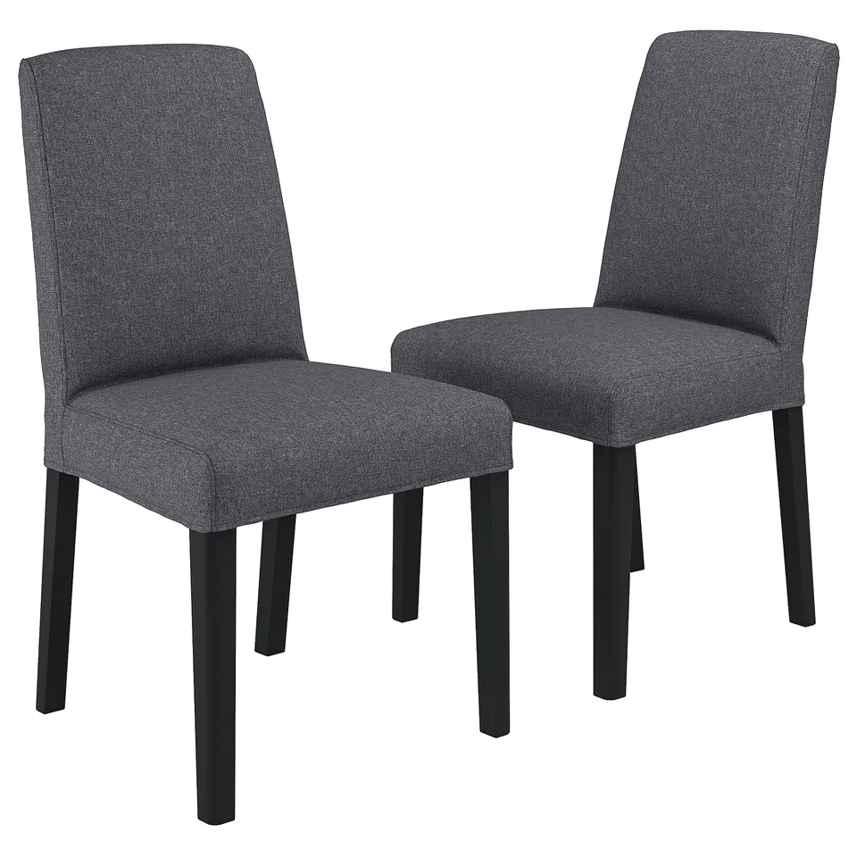 Two grey fabric dining chairs with black legs, upholstered for comfort.