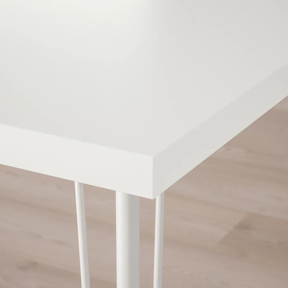 White LAGKAPTEN table corner, clean, modern design, high-quality finish.