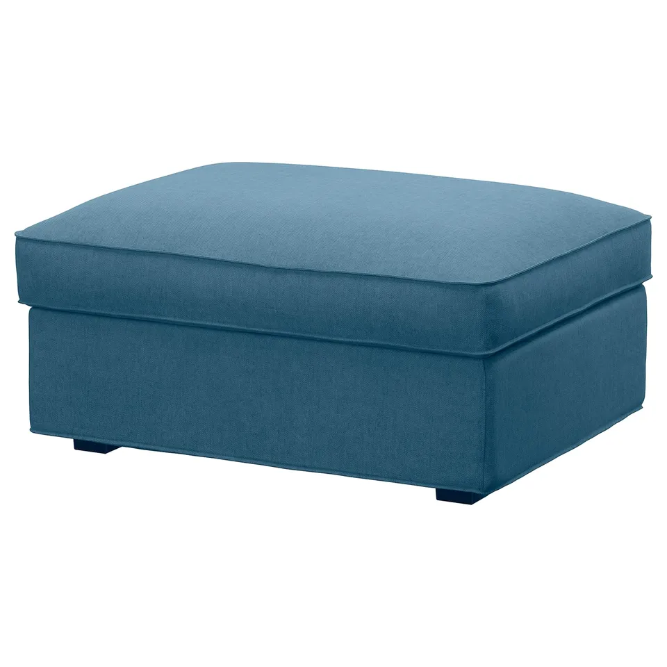 An ikea KIVIK footstool in blue. Covered in durable, machine-washable fabric, it has a rectangular shape and dark wooden legs.