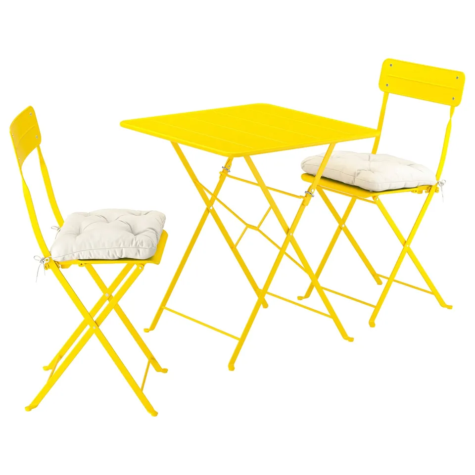 Bright yellow foldable outdoor table and two chairs with beige cushions, perfect for small spaces.