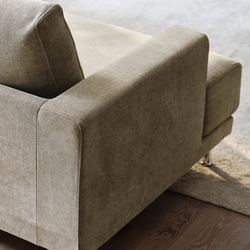 Modern sofa with clean design, plush cushions, and sturdy build.