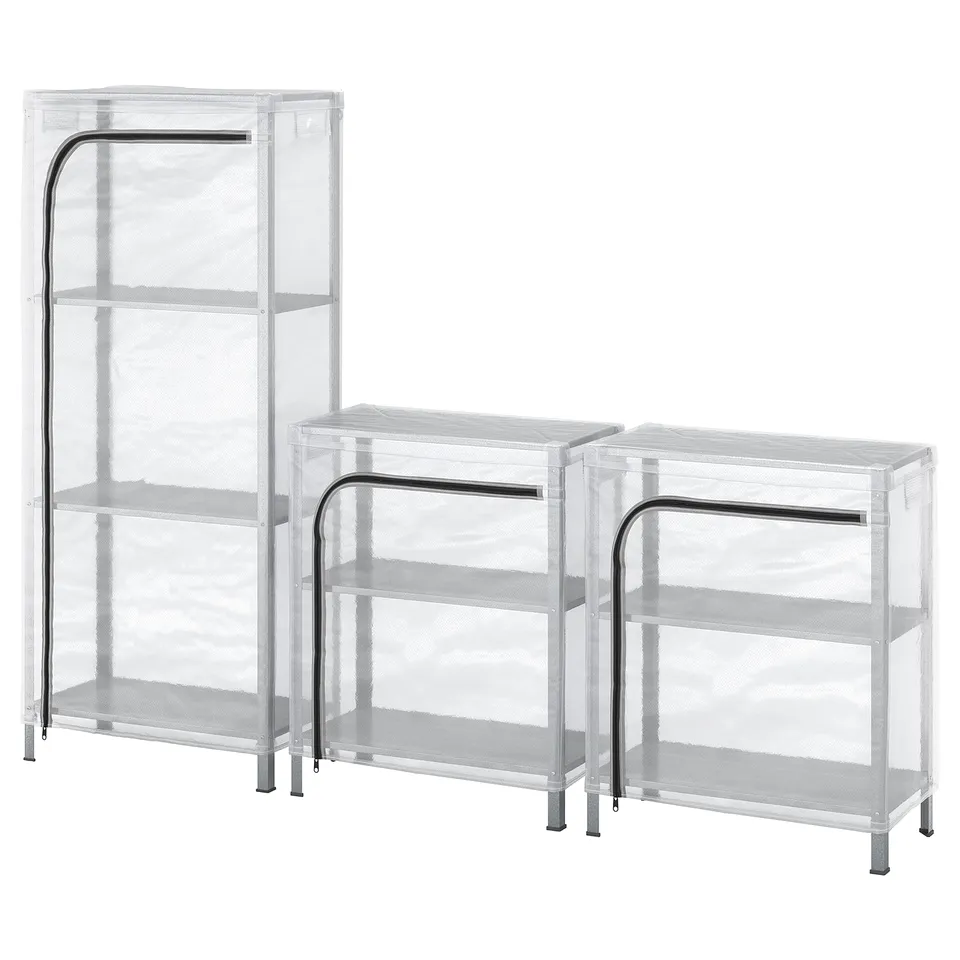 Three shelving units: two small, one tall. Clear covers with curved tops. Stands on metal legs.