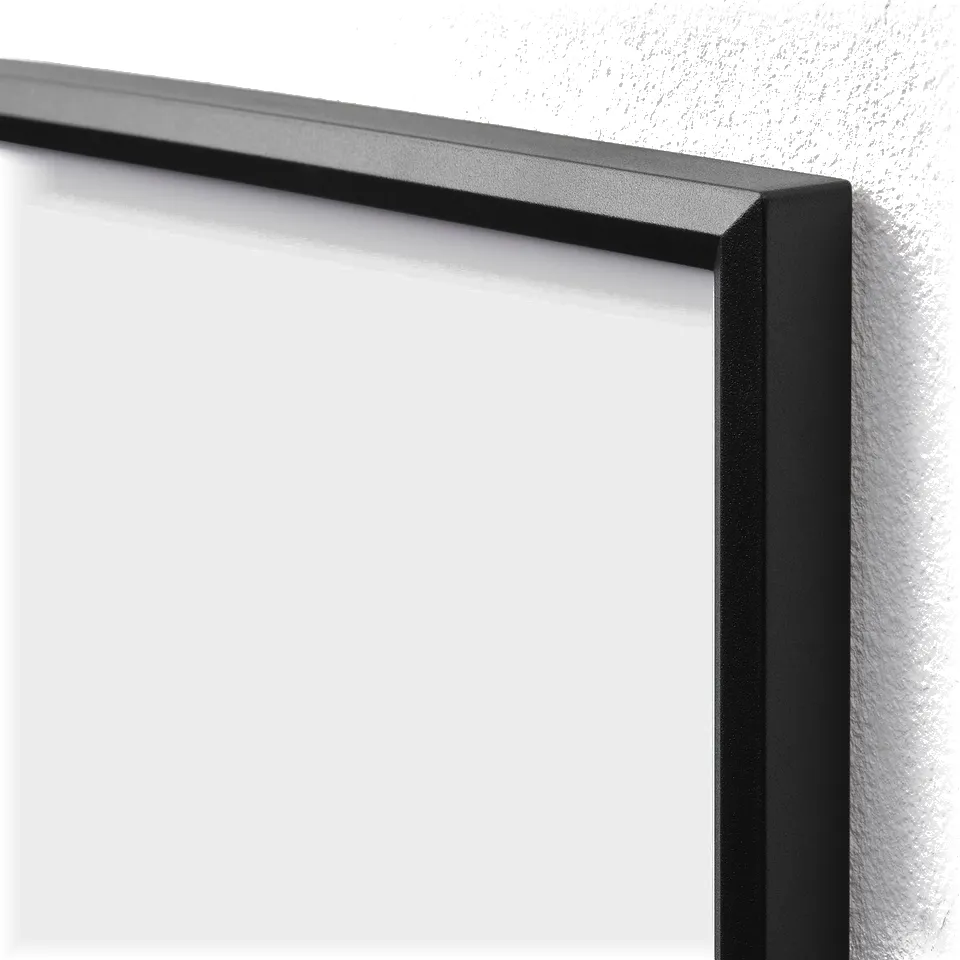 Black picture frame corner detail, showcasing modern design with clean lines and smooth finish.
