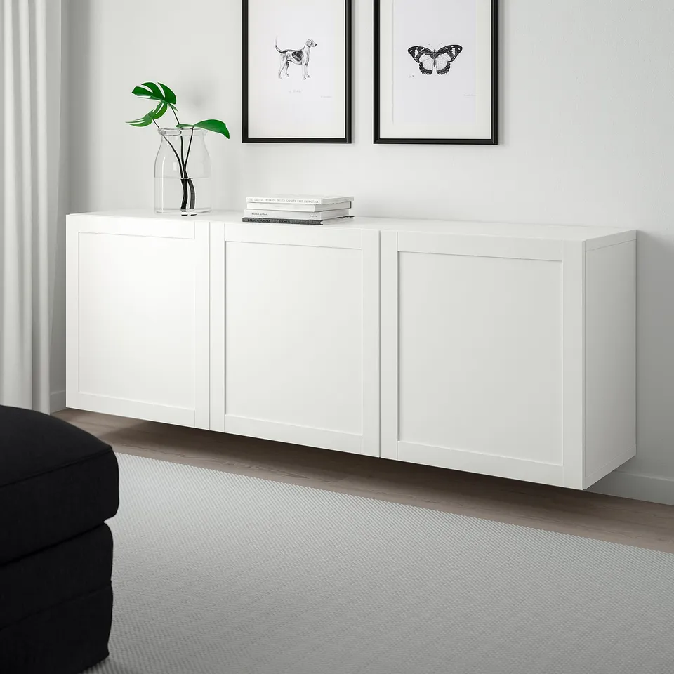 White BESTÅ storage unit, large, below wall art.