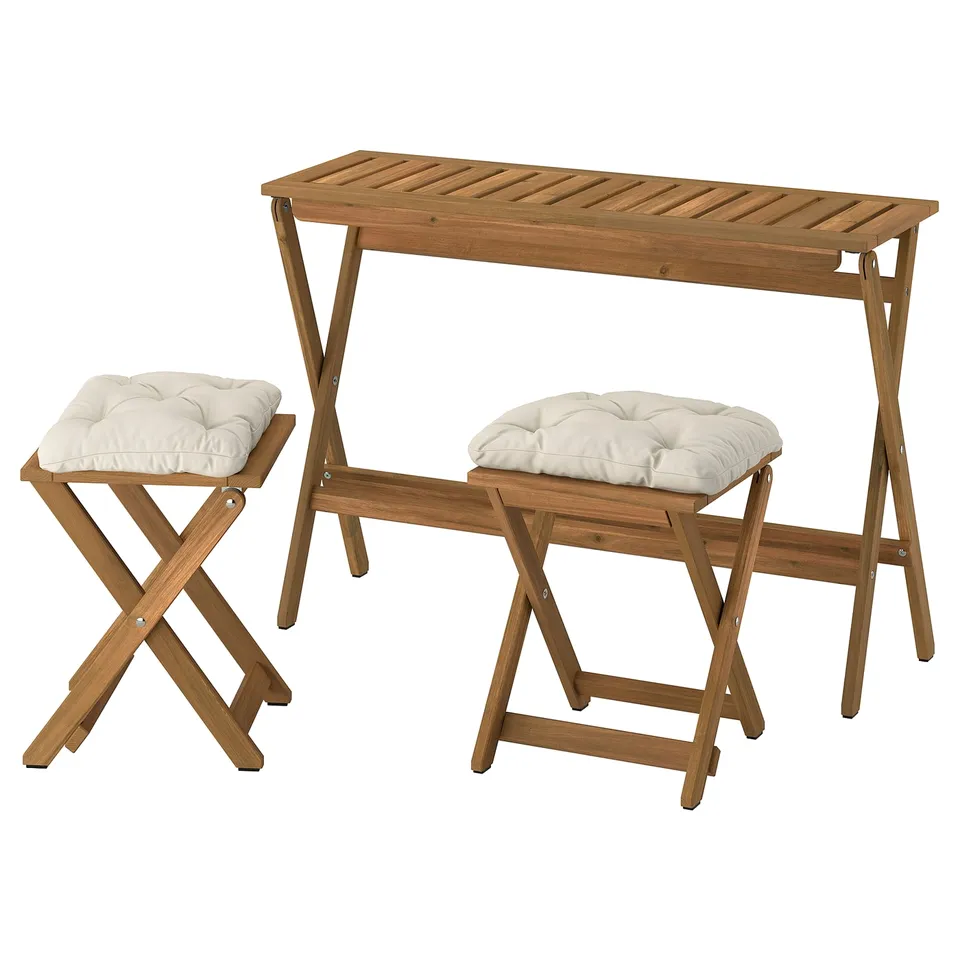 Sustainable outdoor furniture set: wooden table & stools with beige cushions, designed for comfort and eco-friendliness.