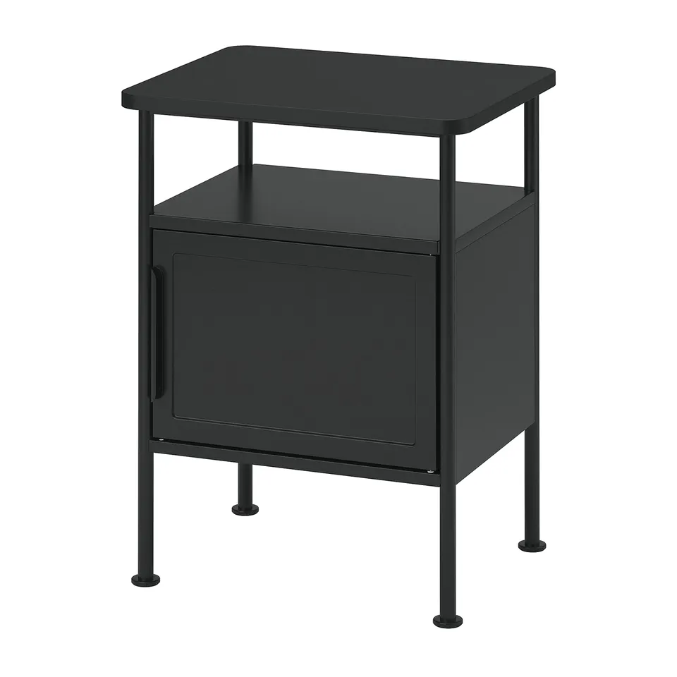 The GRÅFJÄLLET black bedside table metal legs, a square top, and a cabinet with a single door, combining industrial design with practical storage.