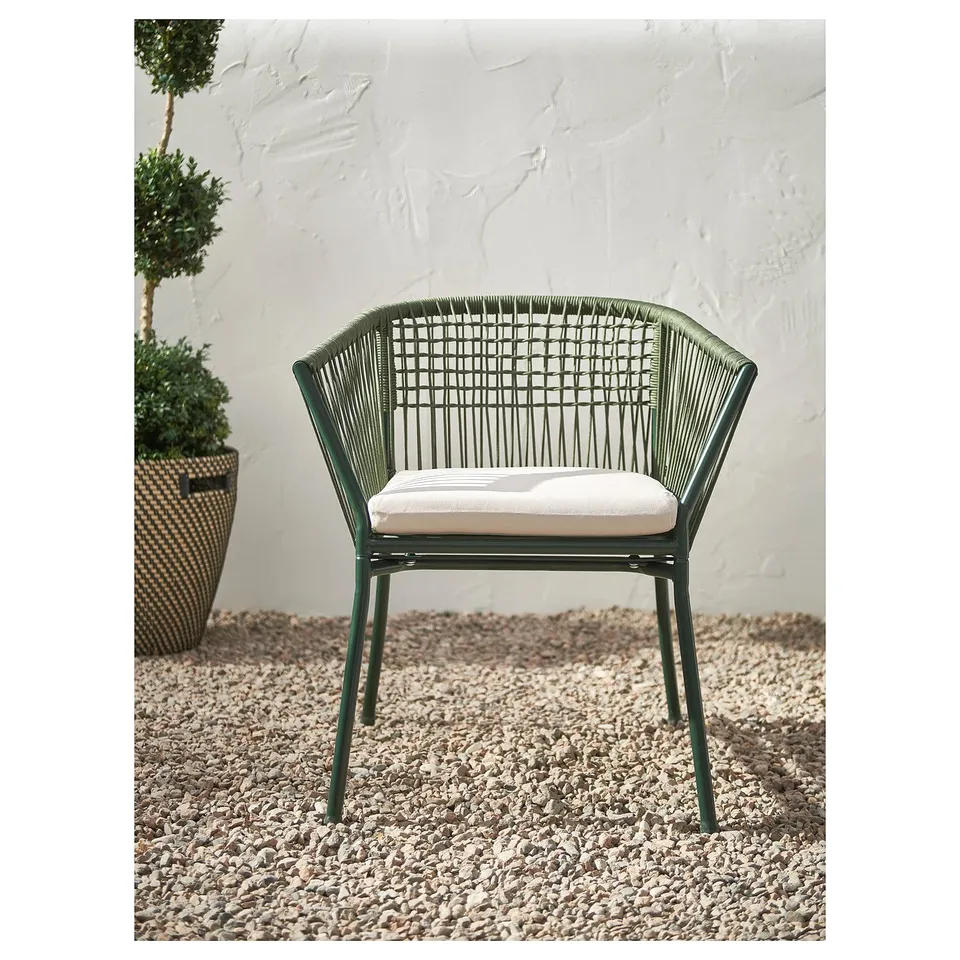 Green SEGERÖN outdoor chair with cushion.