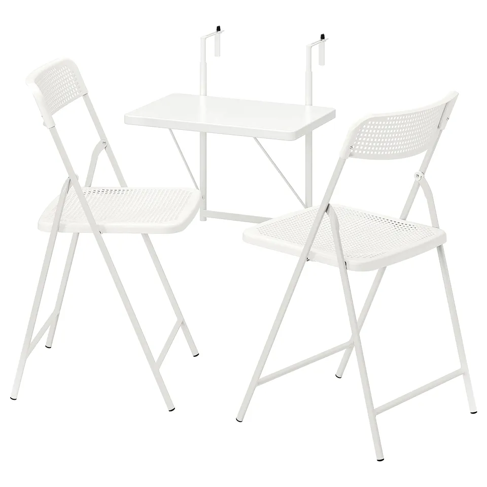 Caption: TORPARÖ set, white. Foldable outdoor table and chairs, minimalist design.