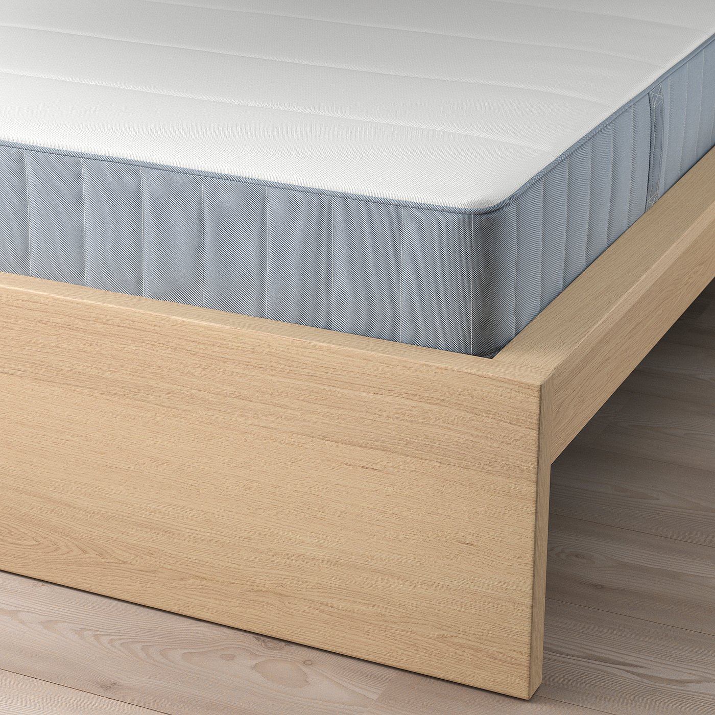 MALM bed with adjustable slats, high headboard, and solid wood veneer.