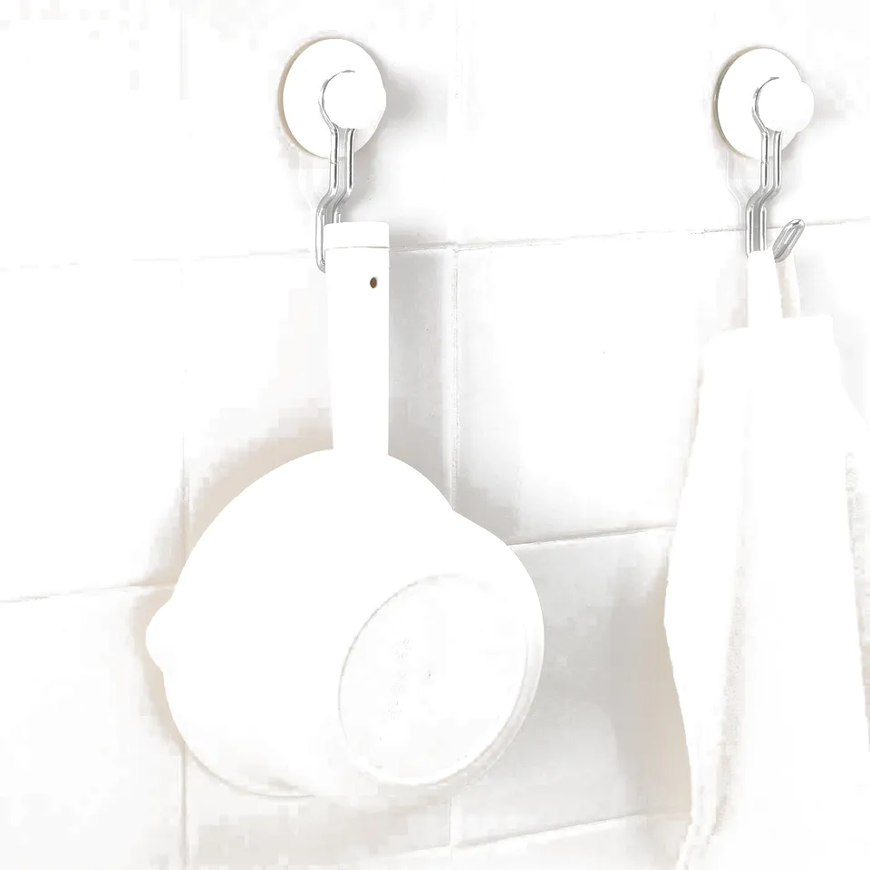 Wall-mounted white container with handle, likely for holding small items in a bathroom.