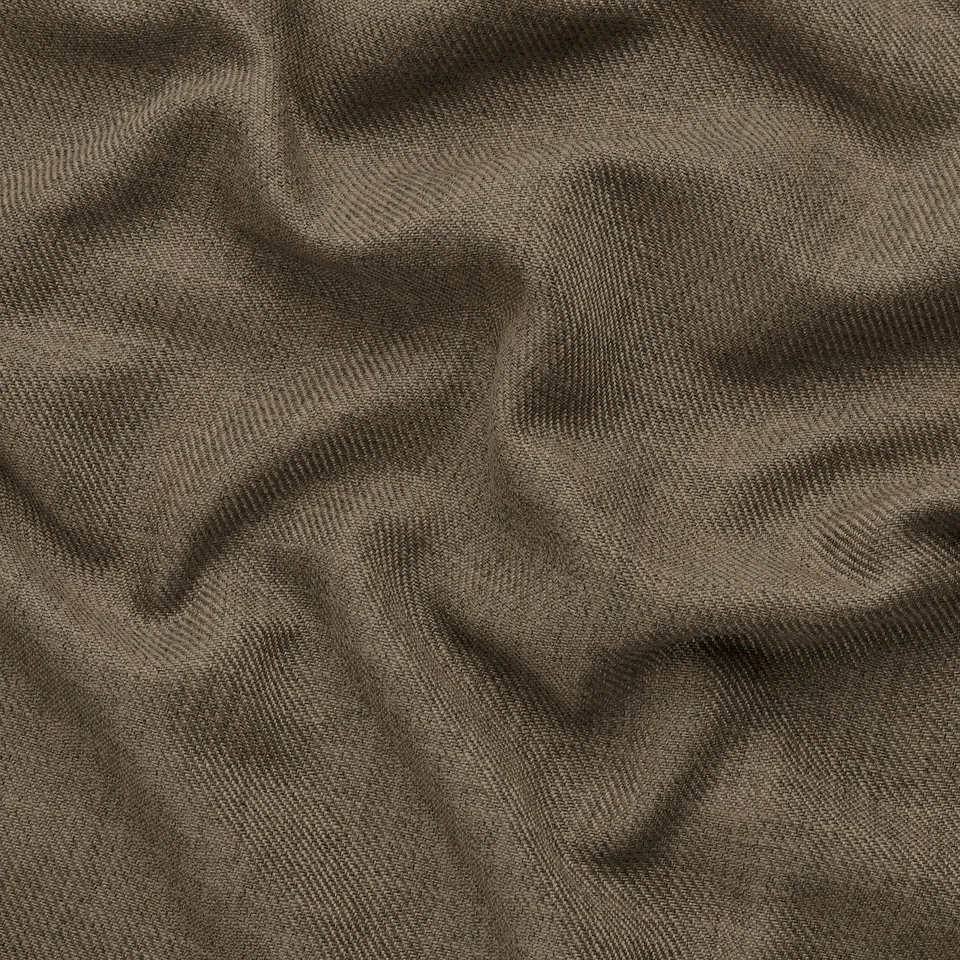 Close-up shot of high-quality, eco-friendly EKTORP fabric in neutral tones.