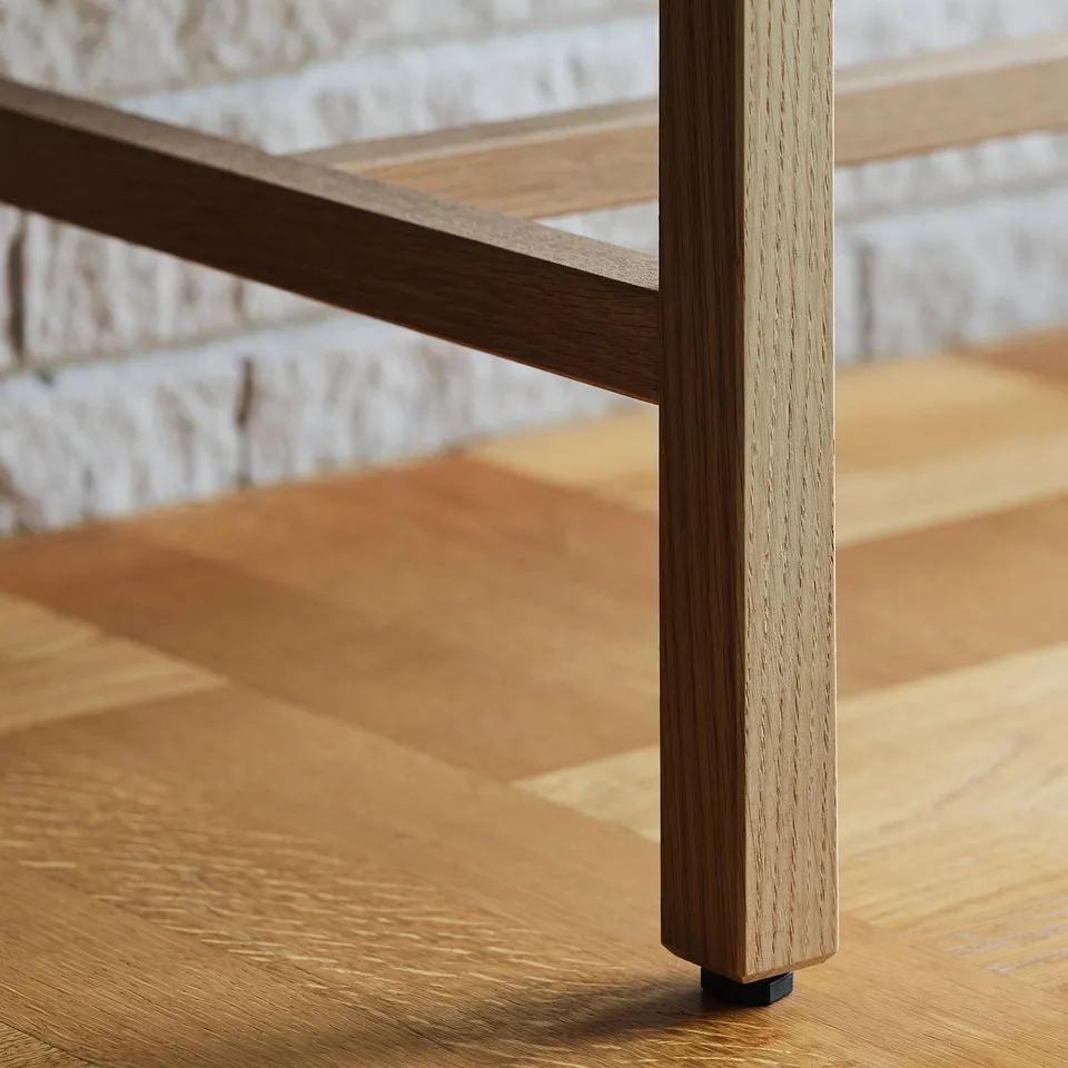 Wooden furniture with sleek, adjustable legs. Rich, polished finish and sturdy craftsmanship.