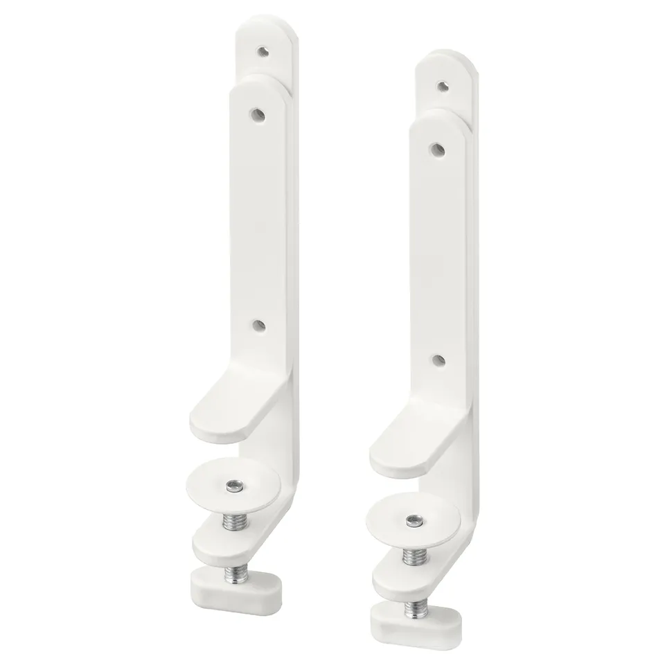 Two white SKÅDIS desk connectors, adjustable, made of coated steel and plastic, for attaching pegboard to desks.