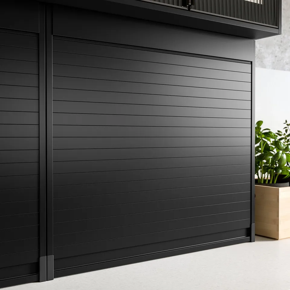 Black TITTEBO storage unit with tambour door, modern design, smooth lines, hidden storage.
