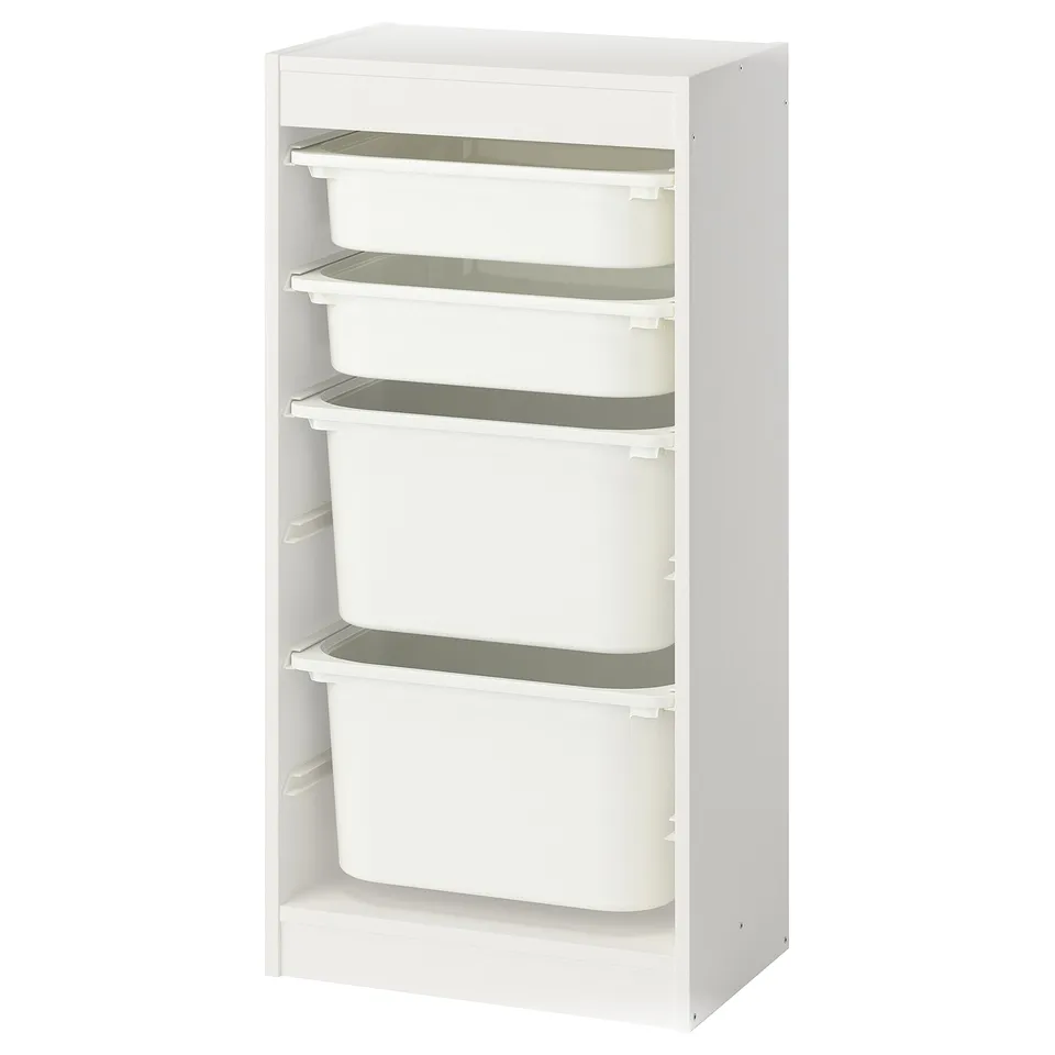 A white TROFAST kids storage unit with four removable plastic bins, organised in two columns.