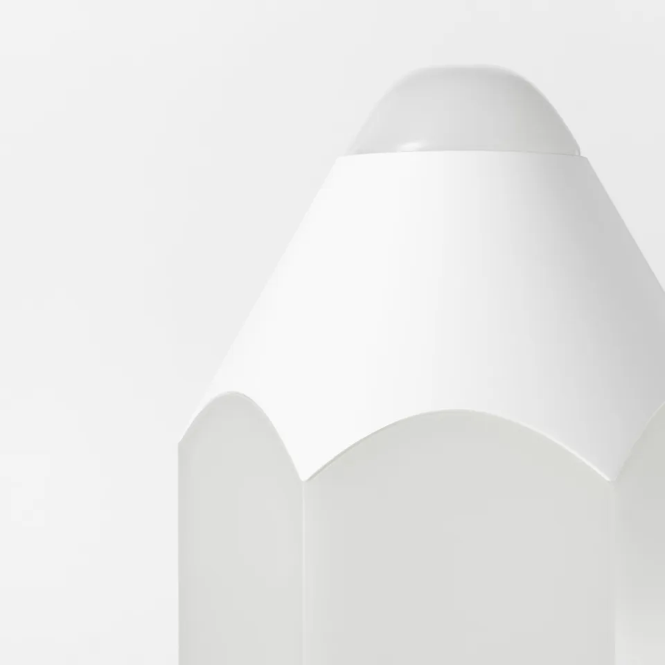 Modern white lamp with smooth curves, likely made of durable plastic, designed for safety and decoration.