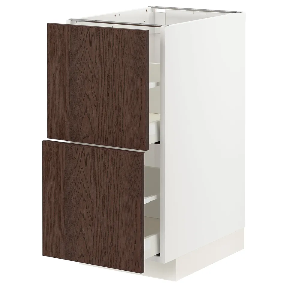 White kitchen cabinet with dark brown wood drawers, rectangular shape.