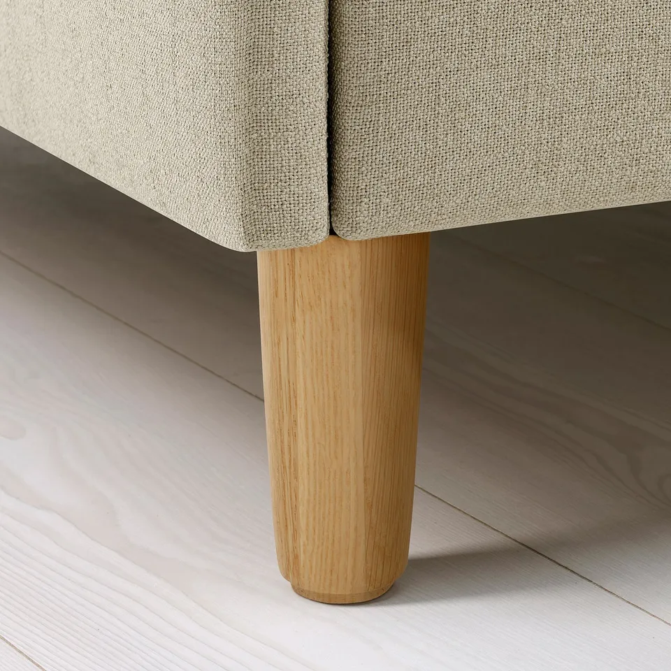 Elegant bed leg; smooth, light oak finish; sturdy, supports upholstered base.