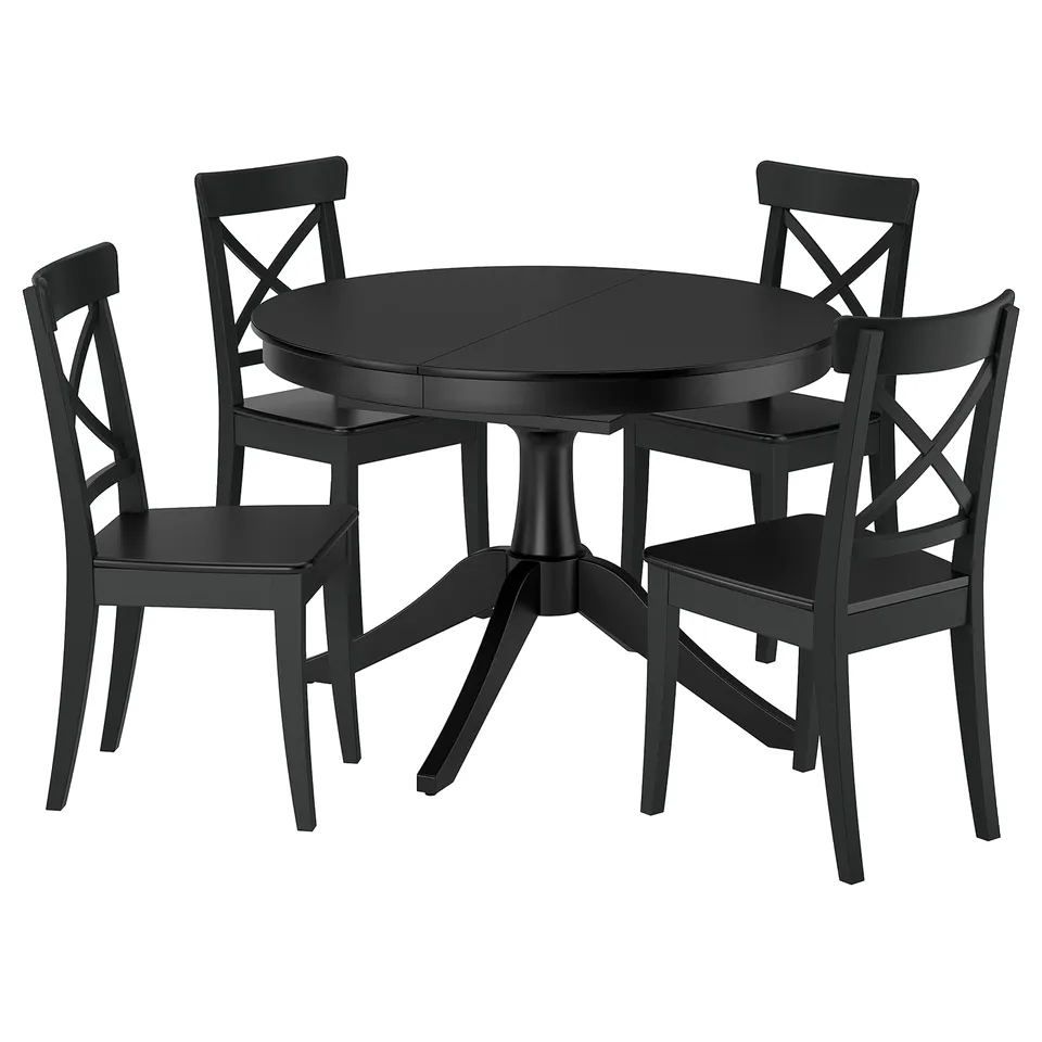 A black ROSENTORP dining set with a round table and four chairs in dark wood.