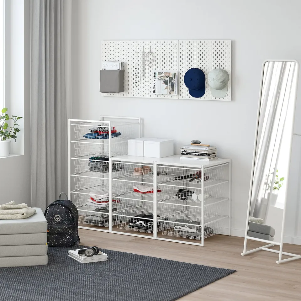 White JONAXEL shoe storage with baskets and shelf.