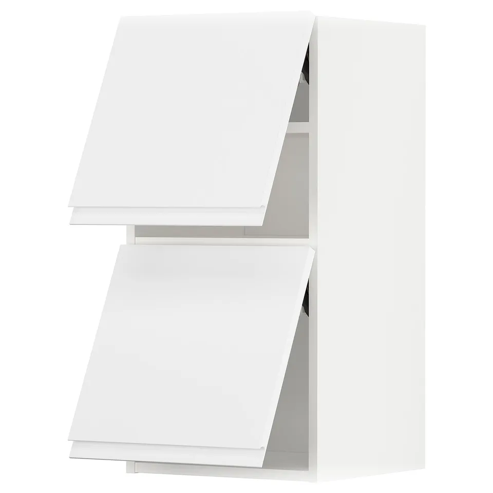 A white METOD kitchen cabinet with two open drawers.