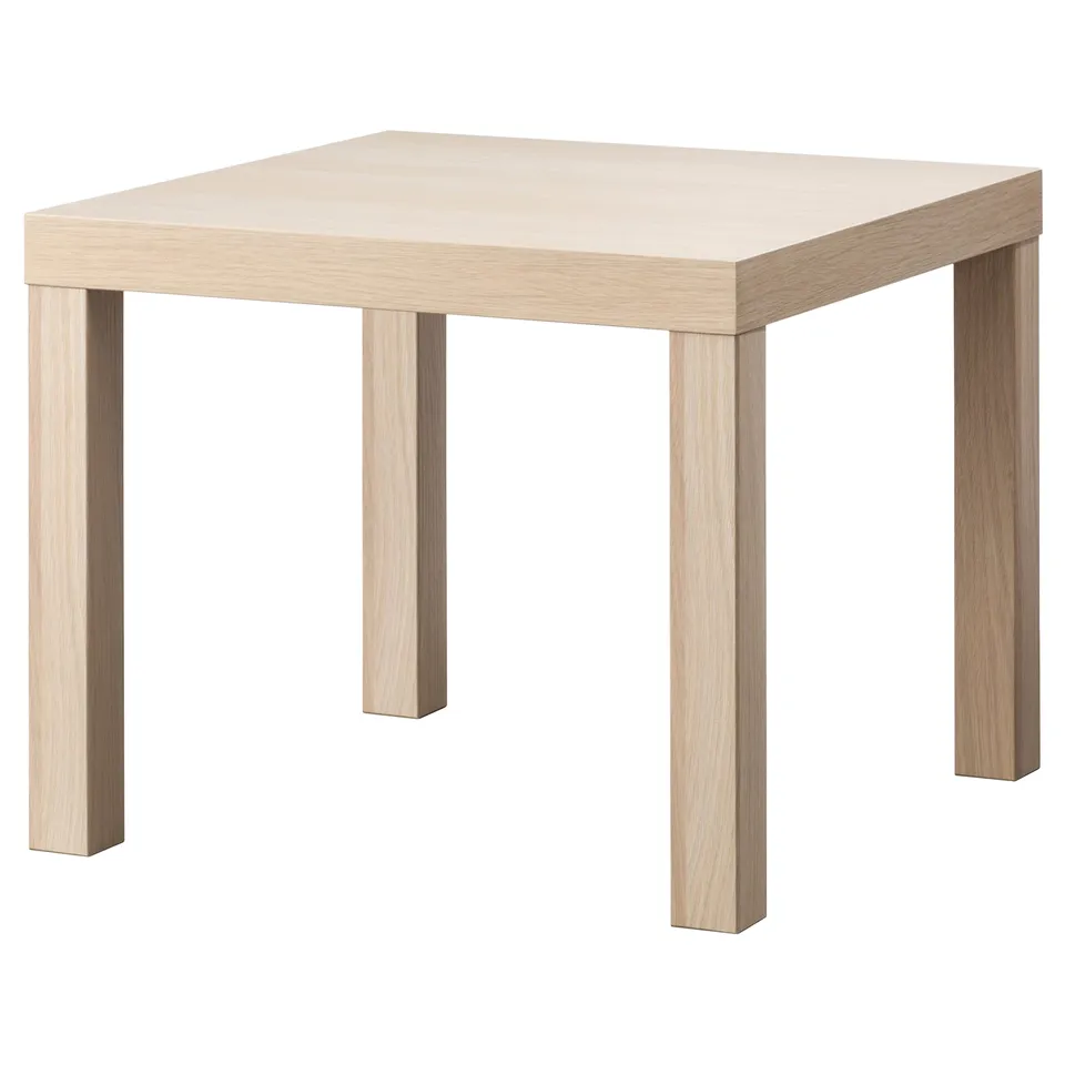 A LACK side table. Its square-shaped, light-colored wood, with straight legs and a simple design.