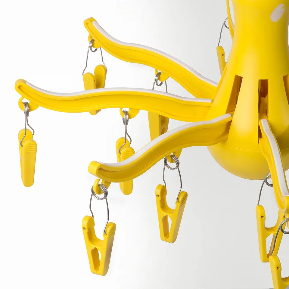 Yellow sock dryer with 16 pegs, recycled plastic & stainless steel, uv-resistant.