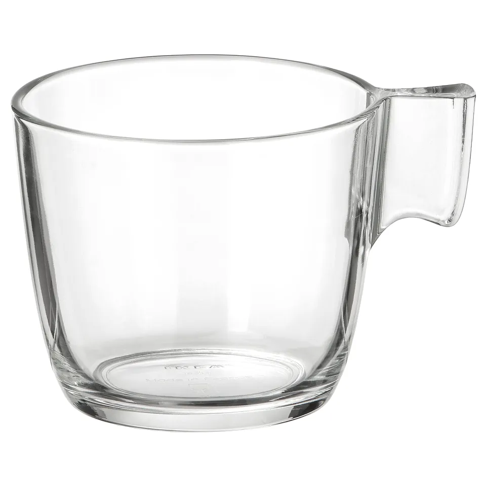 Clear glass mug, STELNA, transparent, cylindrical shape with a handle on the right, made of tempered glass.