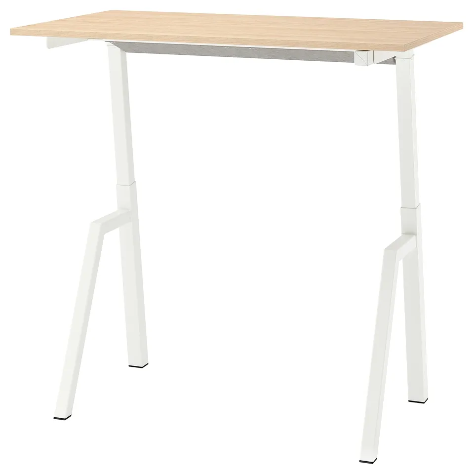 Adjustable height desk, TROTTEN. Light wood top, white metal legs, modern design.