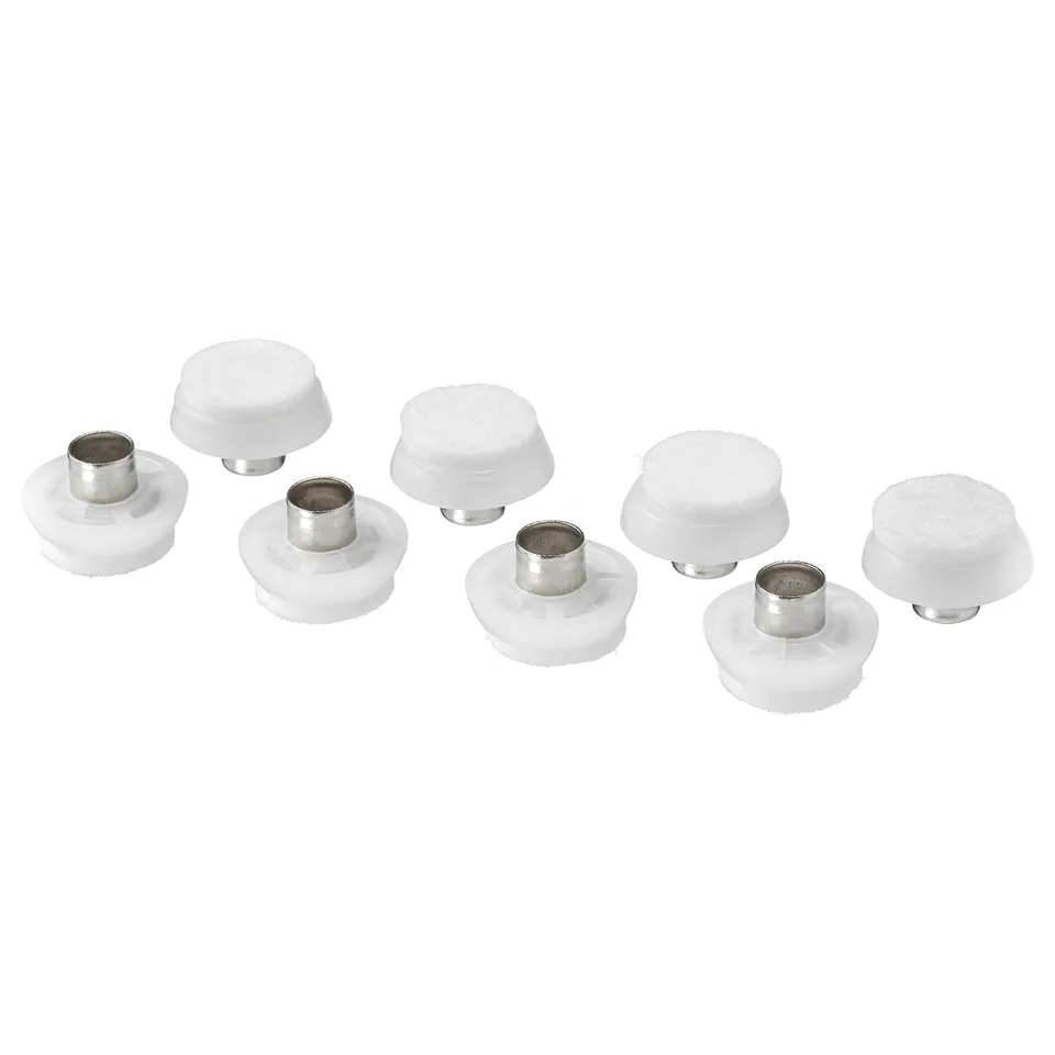 TRIXIG white plastic floor protectors with felt pads and metal rivets.