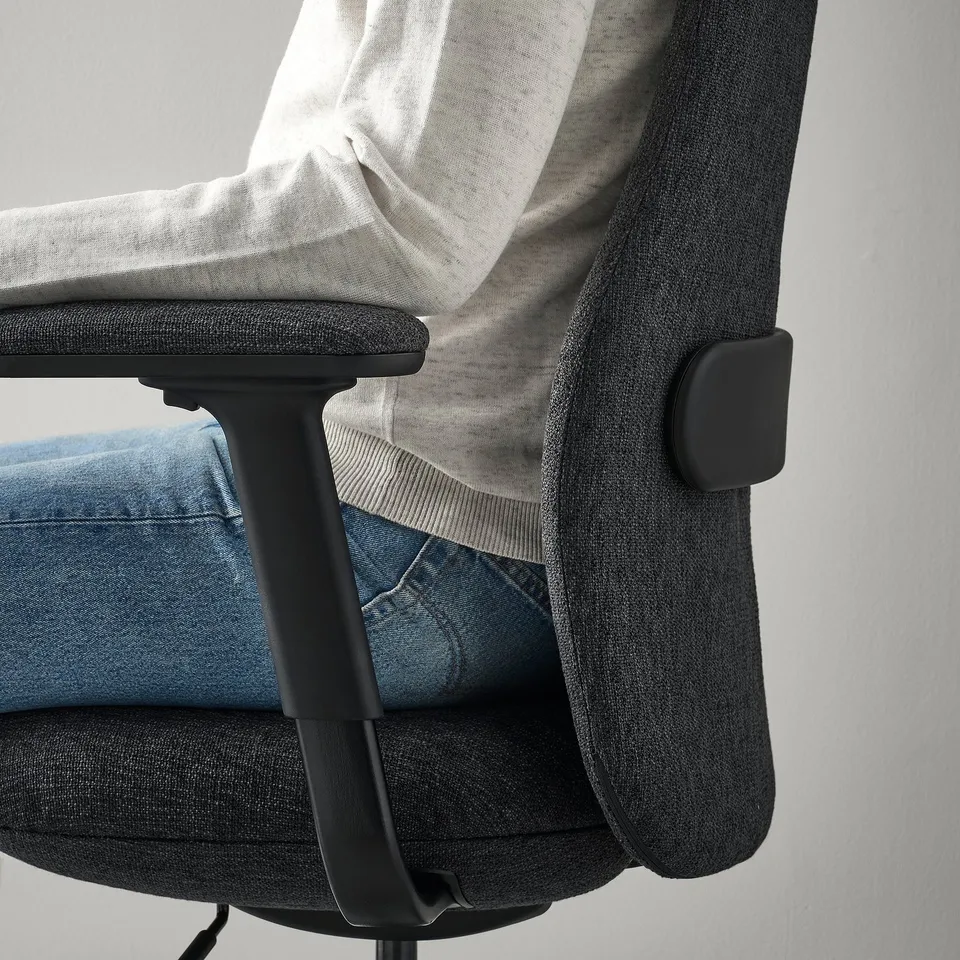 Office chair with adjustable armrests and lumbar support.
