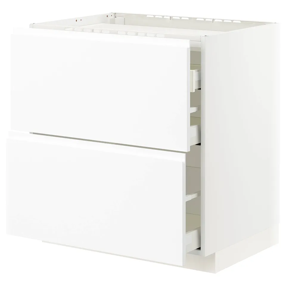 The METOD kitchen cabinet is white, rectangular, with two drawers and minimalist design featuring integrated handles.