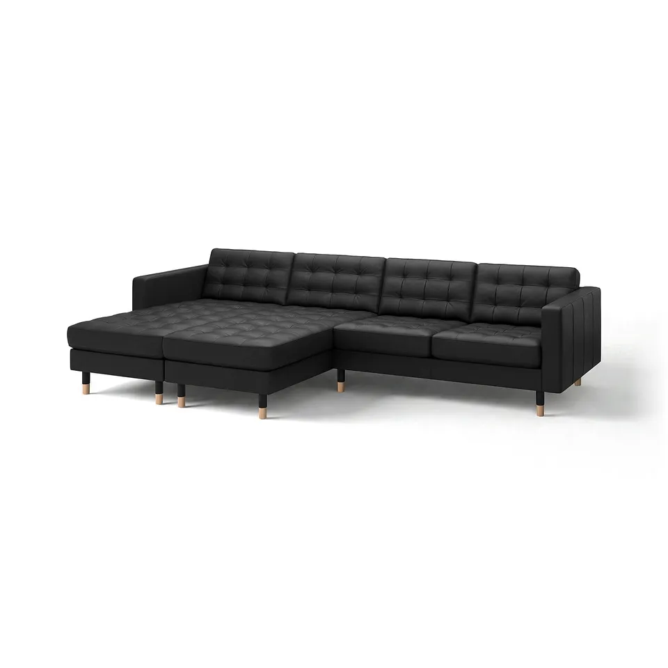 Black l-shaped leather sofa with tufted cushions and wooden legs. Modern, minimalist design ideal for contemporary living rooms.