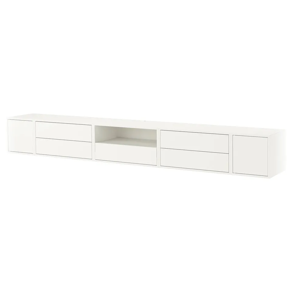 A white EKET storage unit, featuring multiple drawers and an open space. It has a minimalist, rectangular design with clean lines.