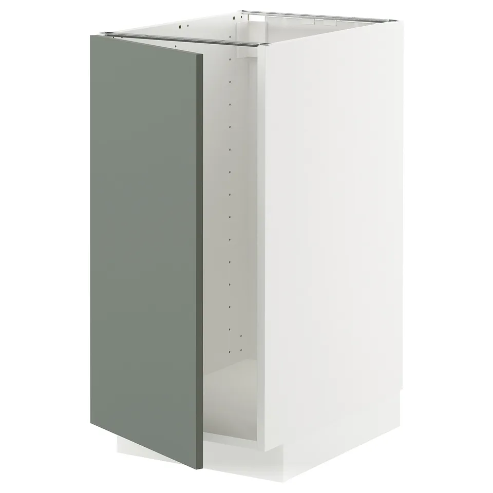 METOD kitchen cabinet in light green with white sides.