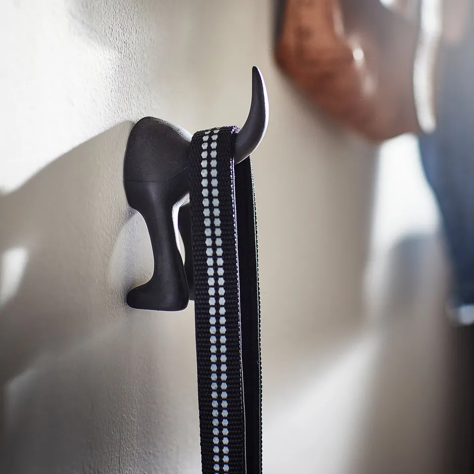 Black elephant hook, modern home decor, practical storage.