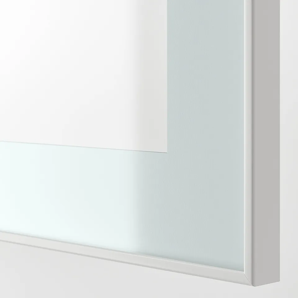 Close-up of modern, white tv storage cabinet showing sleek, clean design with adjustable shelves.