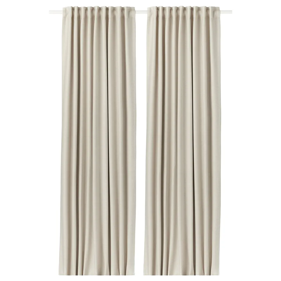 Beige recycled polyester blackout curtains hang side by side, simple style.