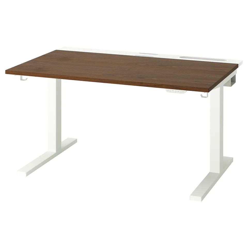 MITTZON brown sit-stand desk with white legs.