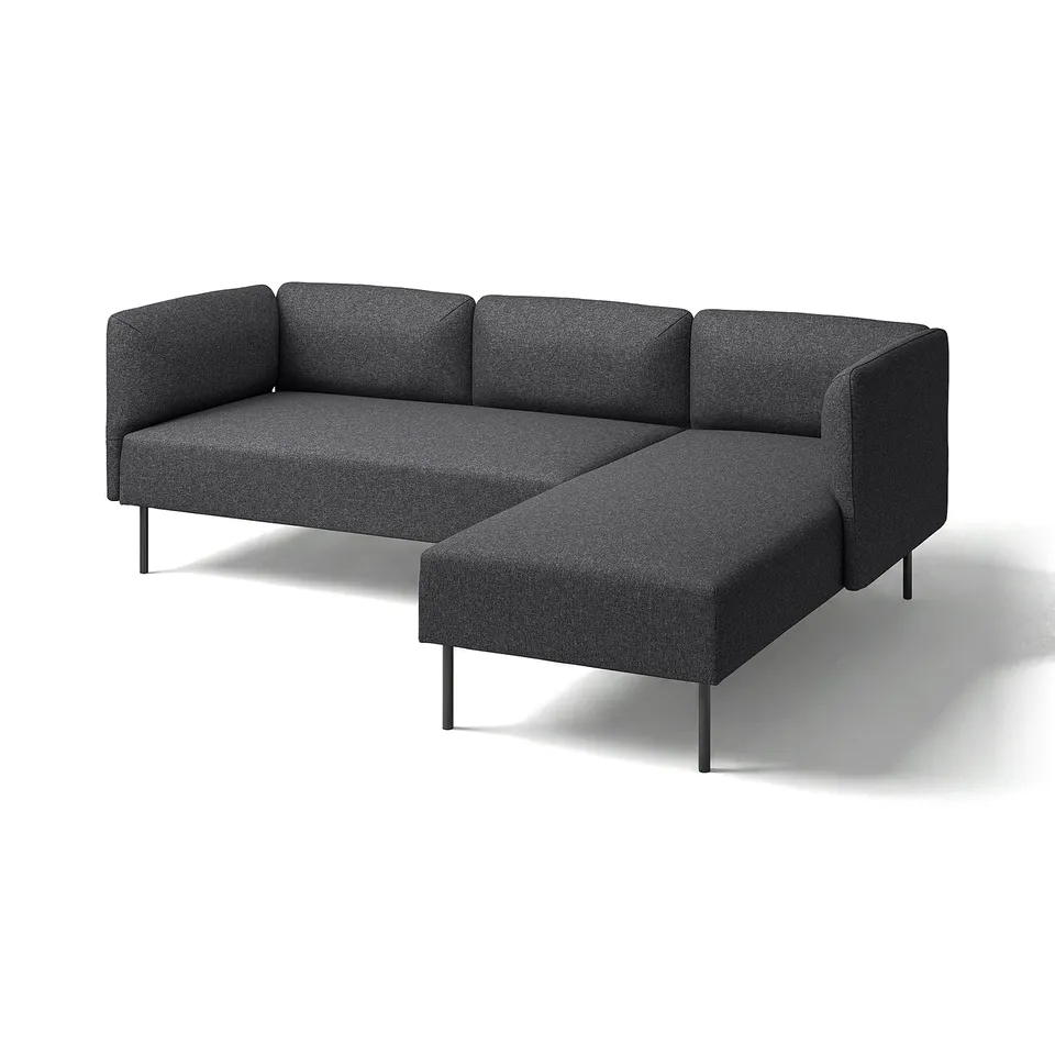 Image depicts a dark grey lillehåm modular sofa with clean lines and curved edges, on slim metal legs.