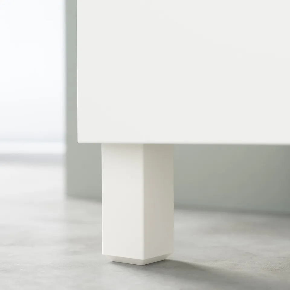 White BESTÅ tv unit leg, sleek and minimalist design.