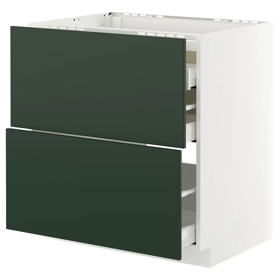 New kitchen unit, dark green drawers, white sides, modern design, integrated storage.