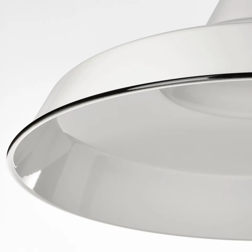Modern pendant lamp with sleek, curved design, glossy finish and chrome accent edge.