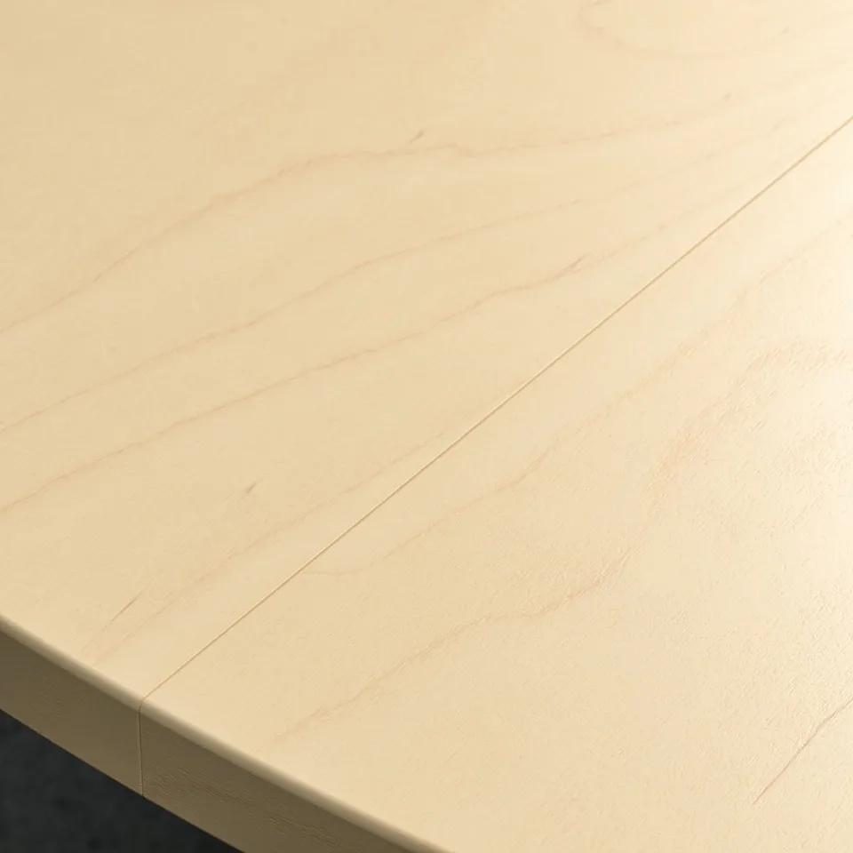 Smooth, well-finished table top; light wood grain visible, clear varnish.