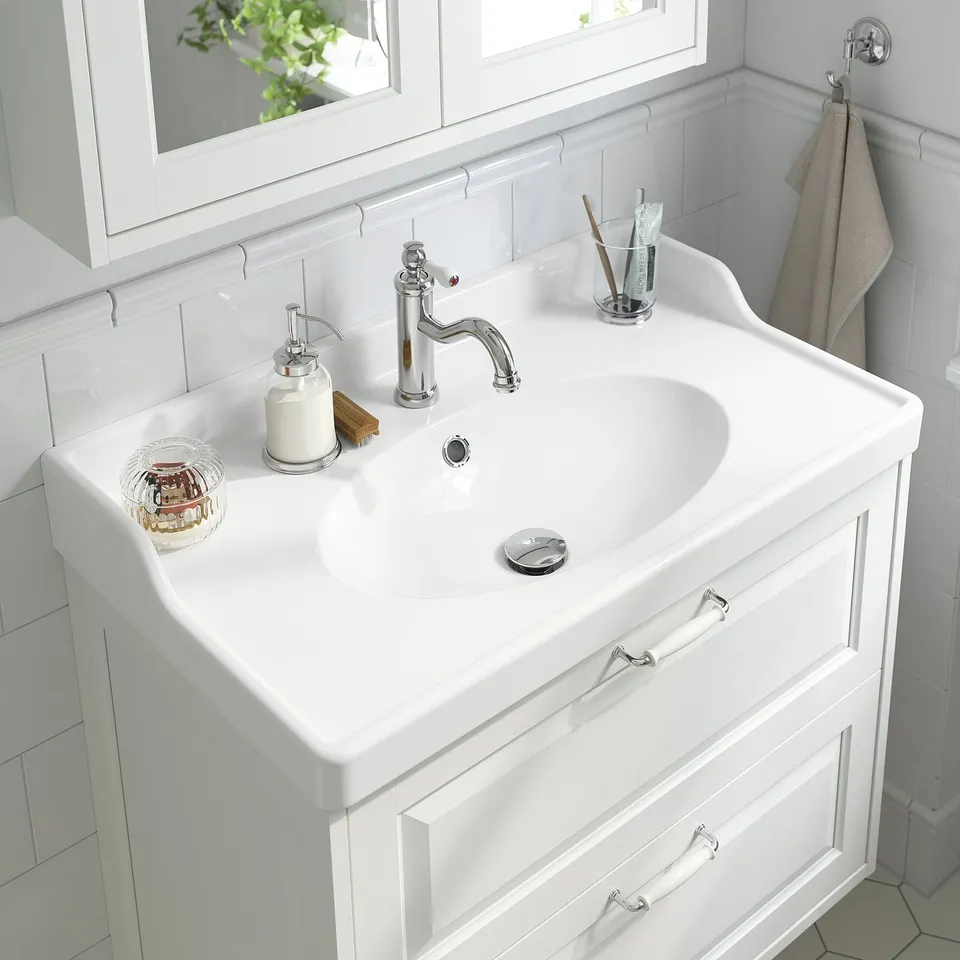 Clean, modern bathroom sink with chrome mixer tap. Cold-start function, saving water and energy.