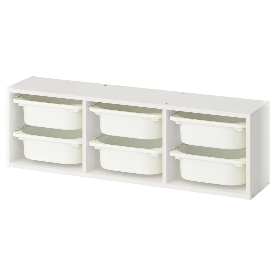 White TROFAST kids storage unit with 6 plastic bins.
