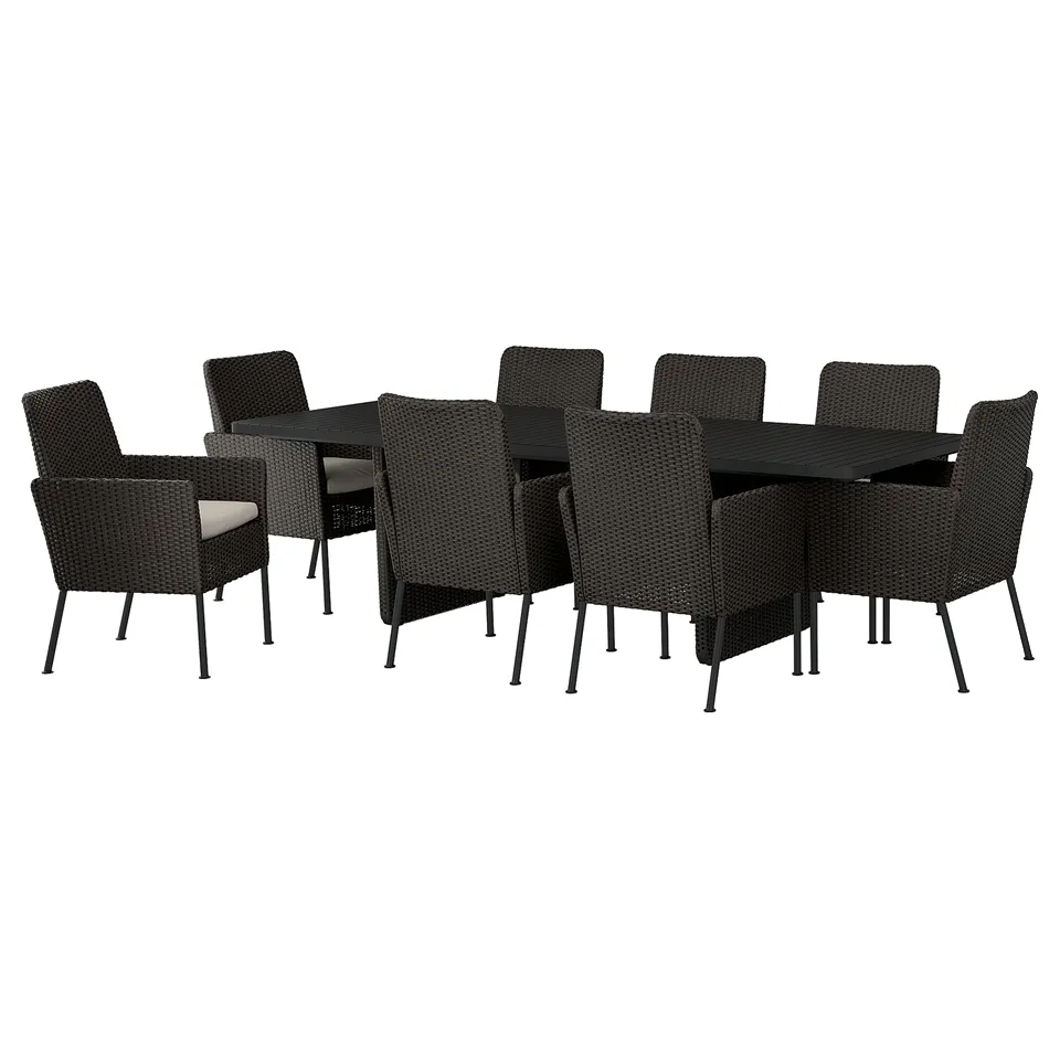 VITTSKÄR: 8-seater outdoor dining set with black, rectangular table and dark grey chairs, woven wicker, modern design.