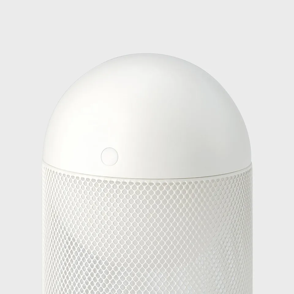 A sleek, white, cylindrical lamp with a textured middle section, likely made of quality plastic and metal, standing upright.