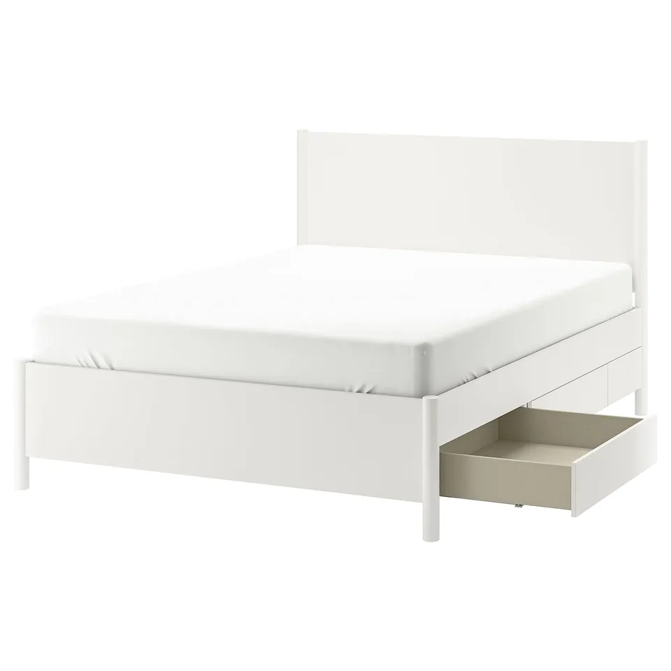 Off-white TONSTAD bed with sleek design and soft-closing drawers.