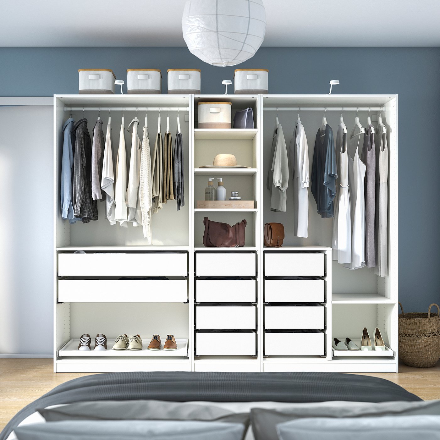 Modern wardrobe with hanging clothes, shelves, and drawers, organised for easy access and visibility.